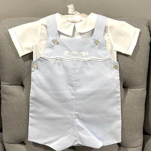 Baby boy hand embroidered romper.